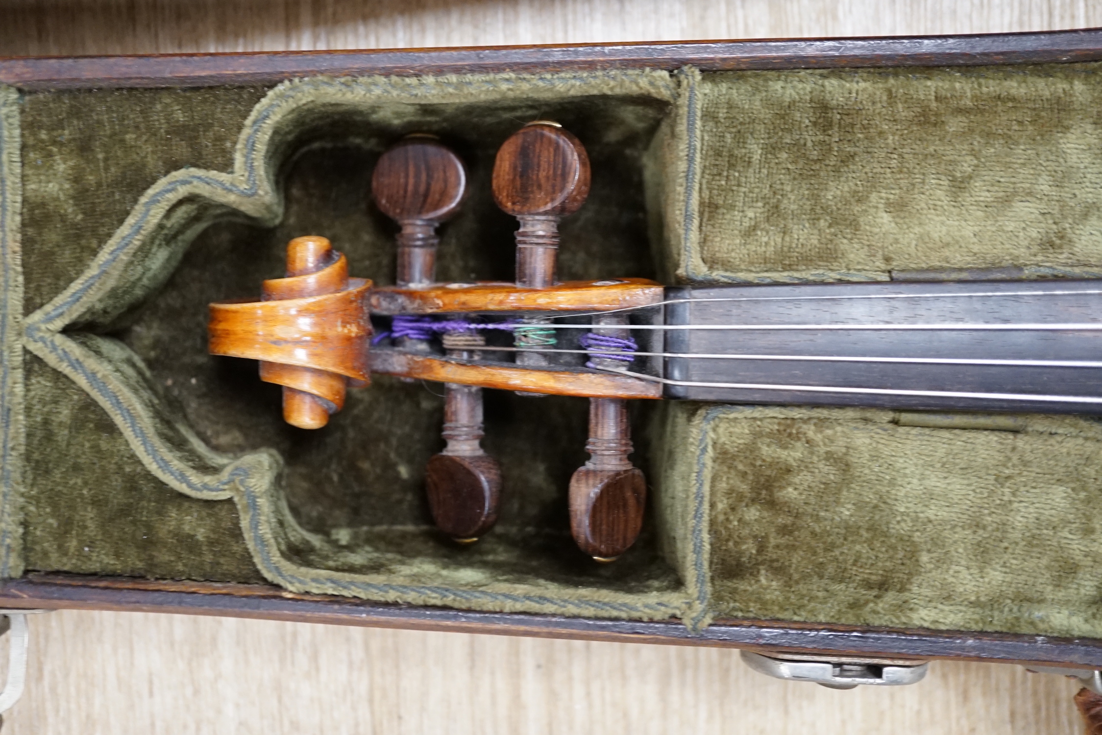 An early 19th century cased Italian violin labelled Florentus Florenus, body length 35cm, with a French silver mounted bow stamped Cuniot Hury, both in a fine Hill style case CITES Submission reference 6VGB2X83